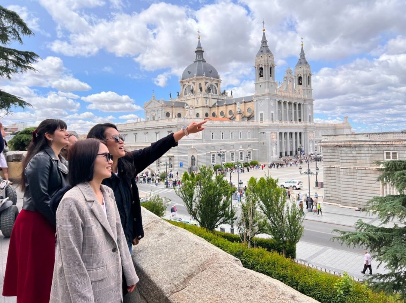 Madrid Royal Palace view with tourists exploring the city