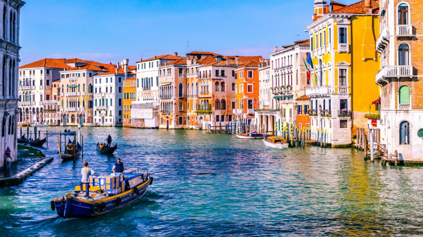 A gondola cruising along the Grand Canal at Venice