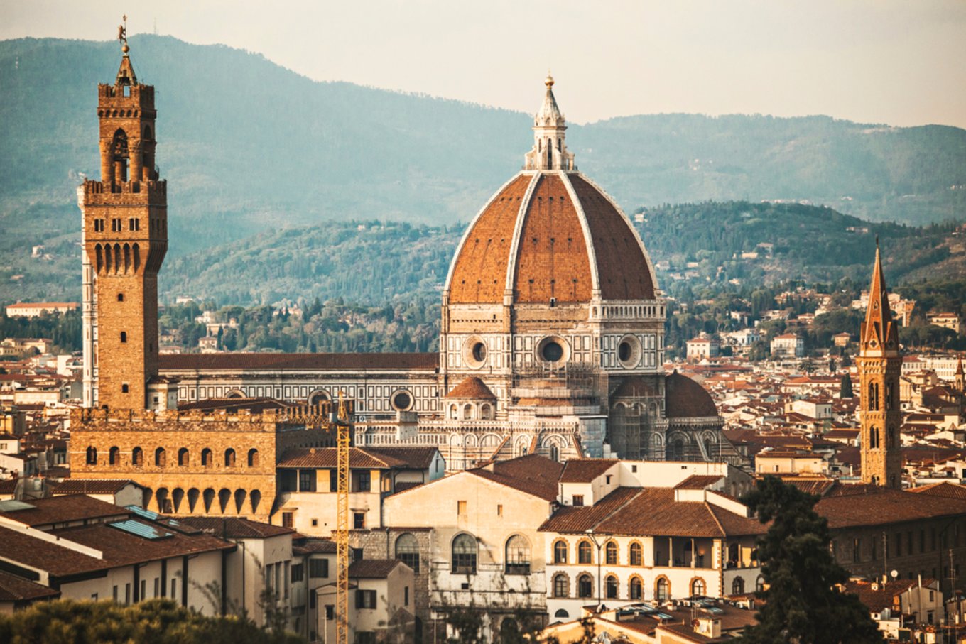 Panoramic view of Florence featuring the Duomo dome and terracotta rooftops