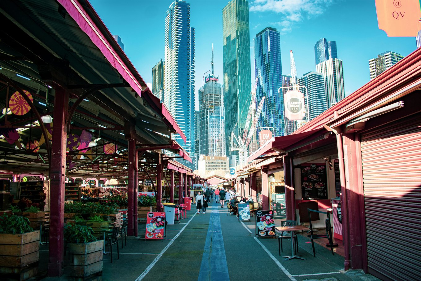A street lined with a market and food stalls