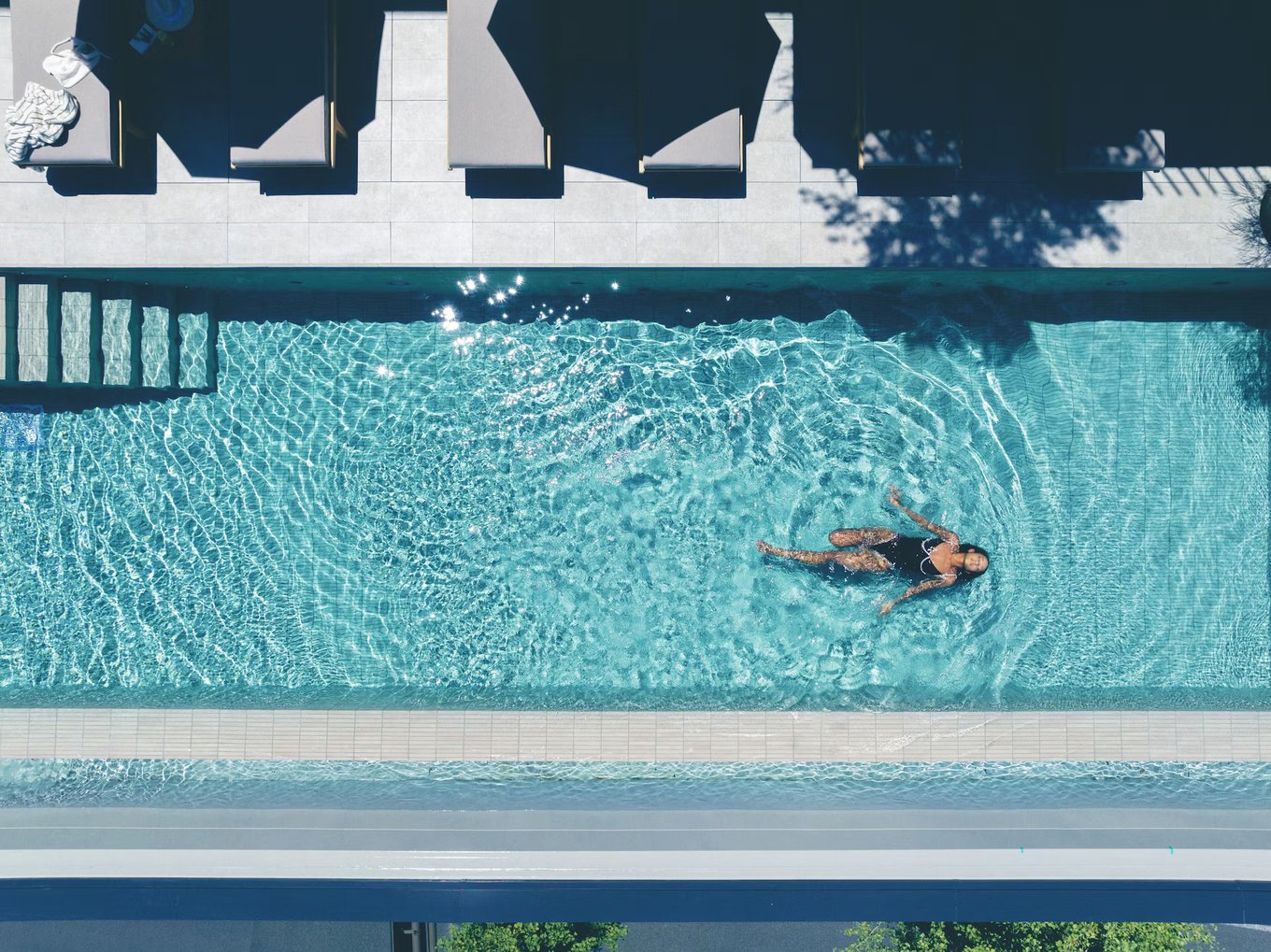 A woman swimming in a pool