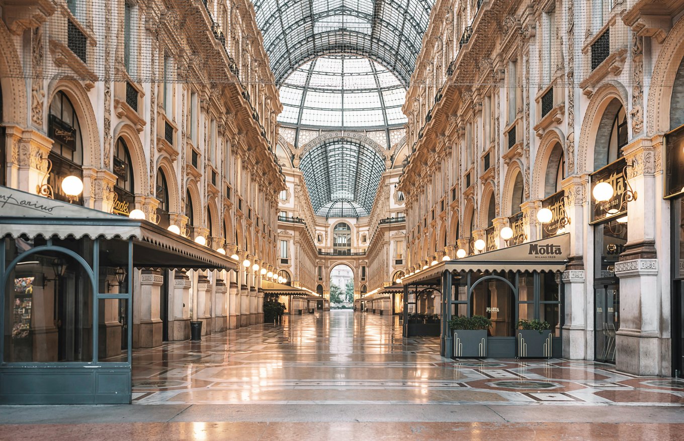Interior of Galleria Vittorio Emanuele II with its iconic glass roof | Photo Credit: Federico Di Dio photography on Unsplash