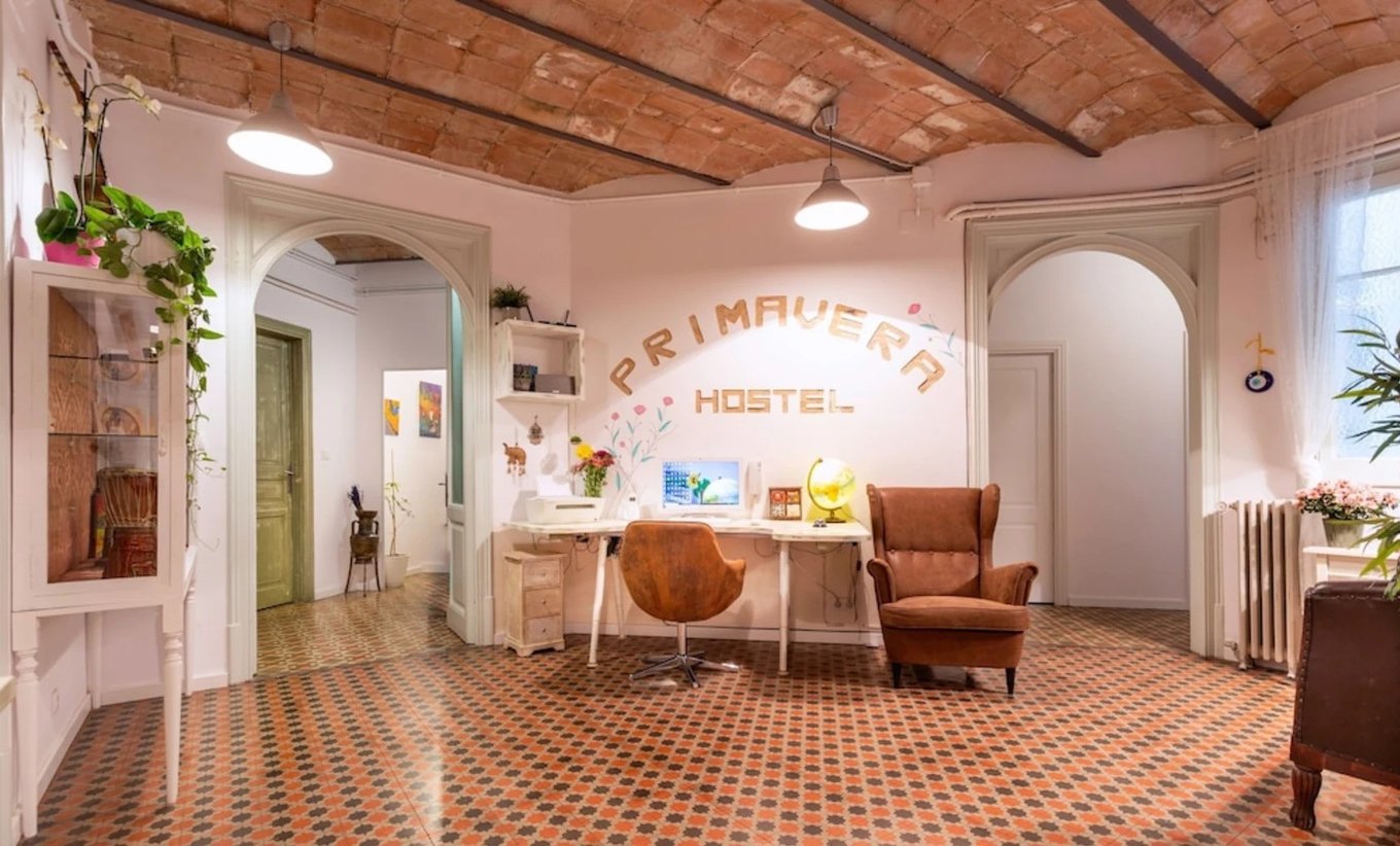Stylish lobby area of Primavera Hostel