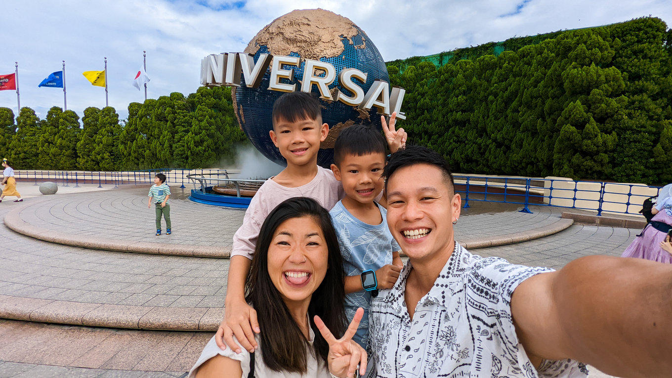 Family in front of the Universal globe in USJ