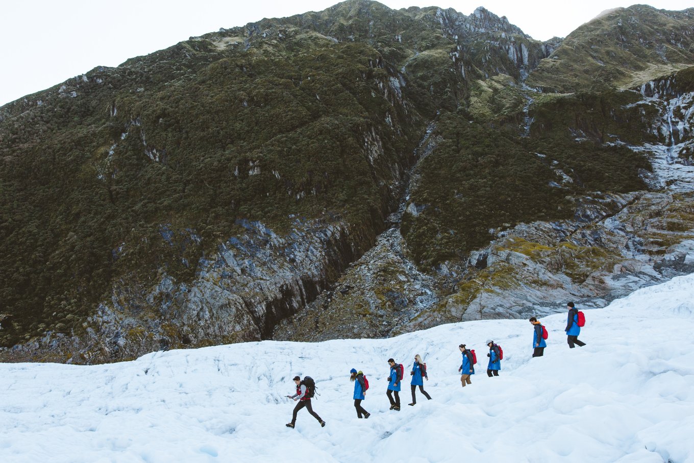 Travelers hiking Mount Cook Aoraki, one of the most popular landmarks in New Zealand.