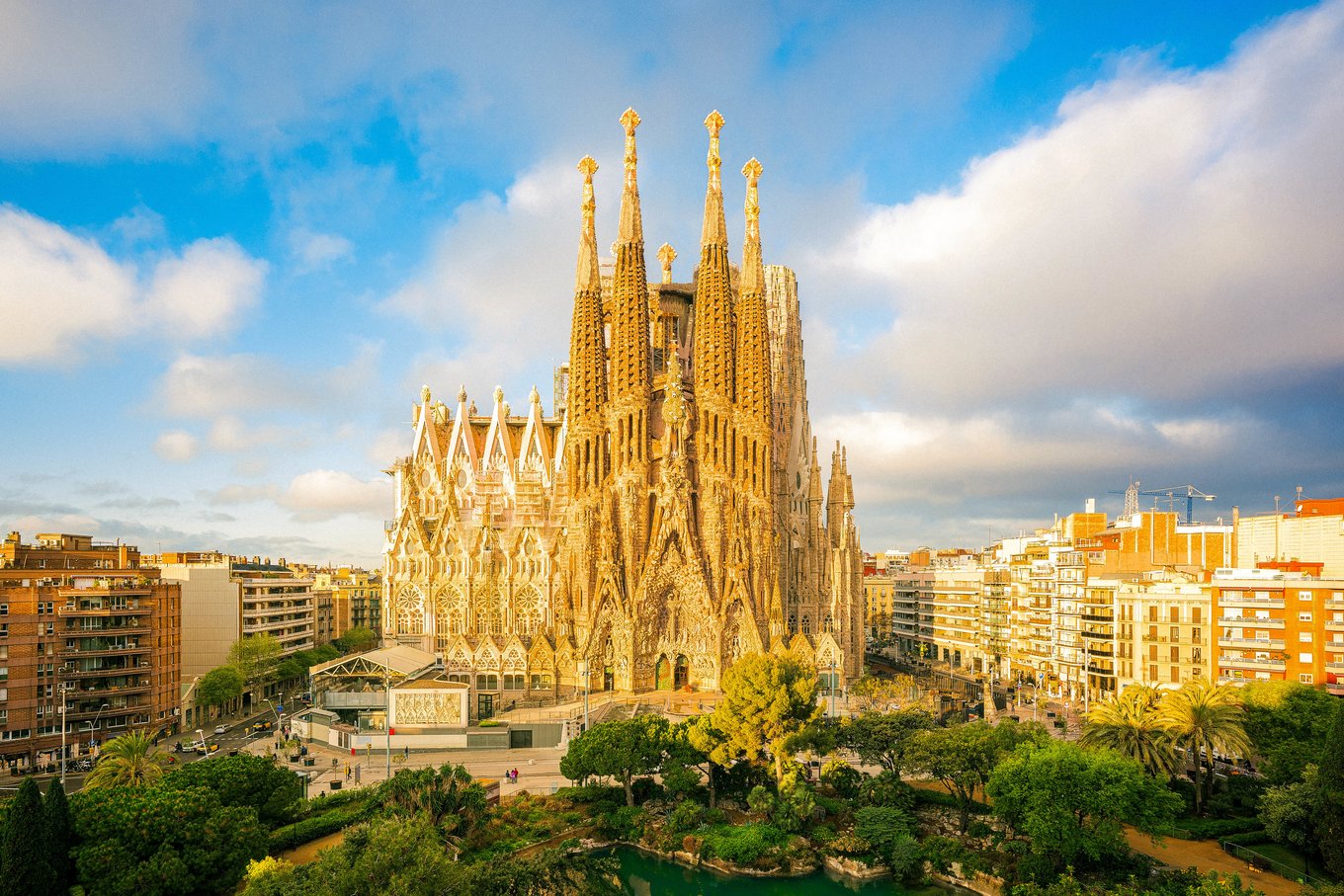 Panoramic view of the Sagrada Família in Barcelona in golden sunlight