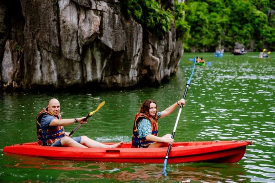 Captivating Ha Long Bay: A Visual Feast for Travel Enthusiasts - 1 Kayaking and swimming in the emerald waters