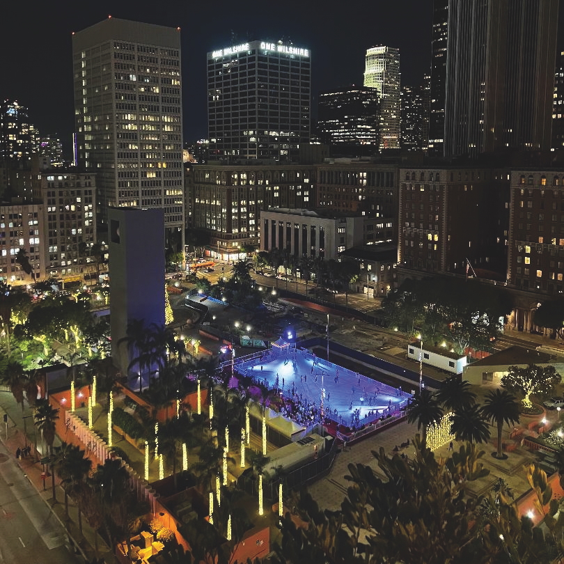 The Holiday Ice Rink Pershing Square - Los Angeles’ Largest Outdoor Ice-Skating Rink along with the annual holiday tree lighting in Pershing Square