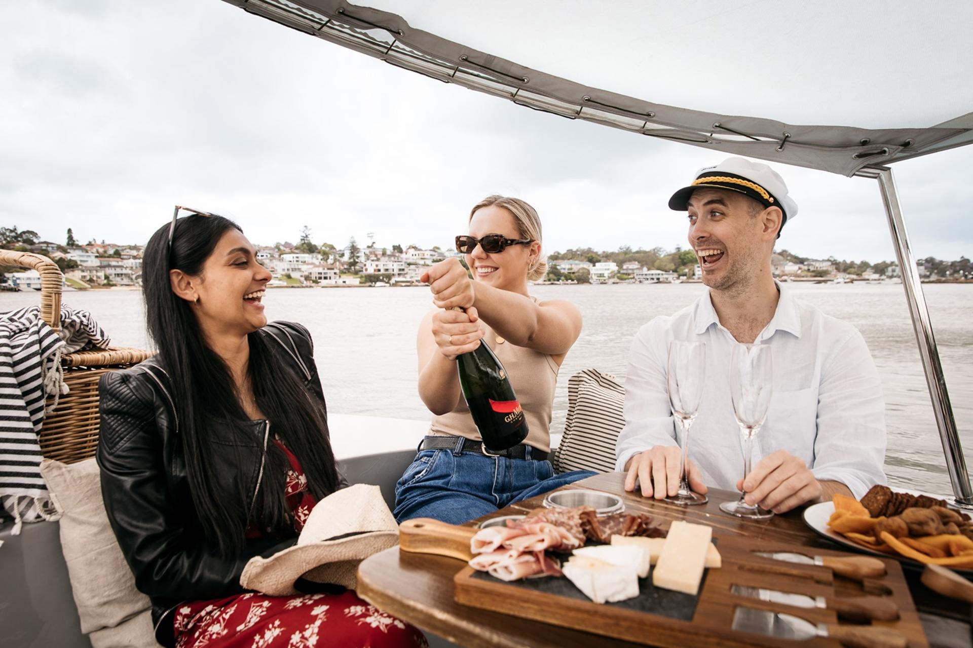 Electric Picnic Boat Rental in Sydney (Cabarita) - Image 1