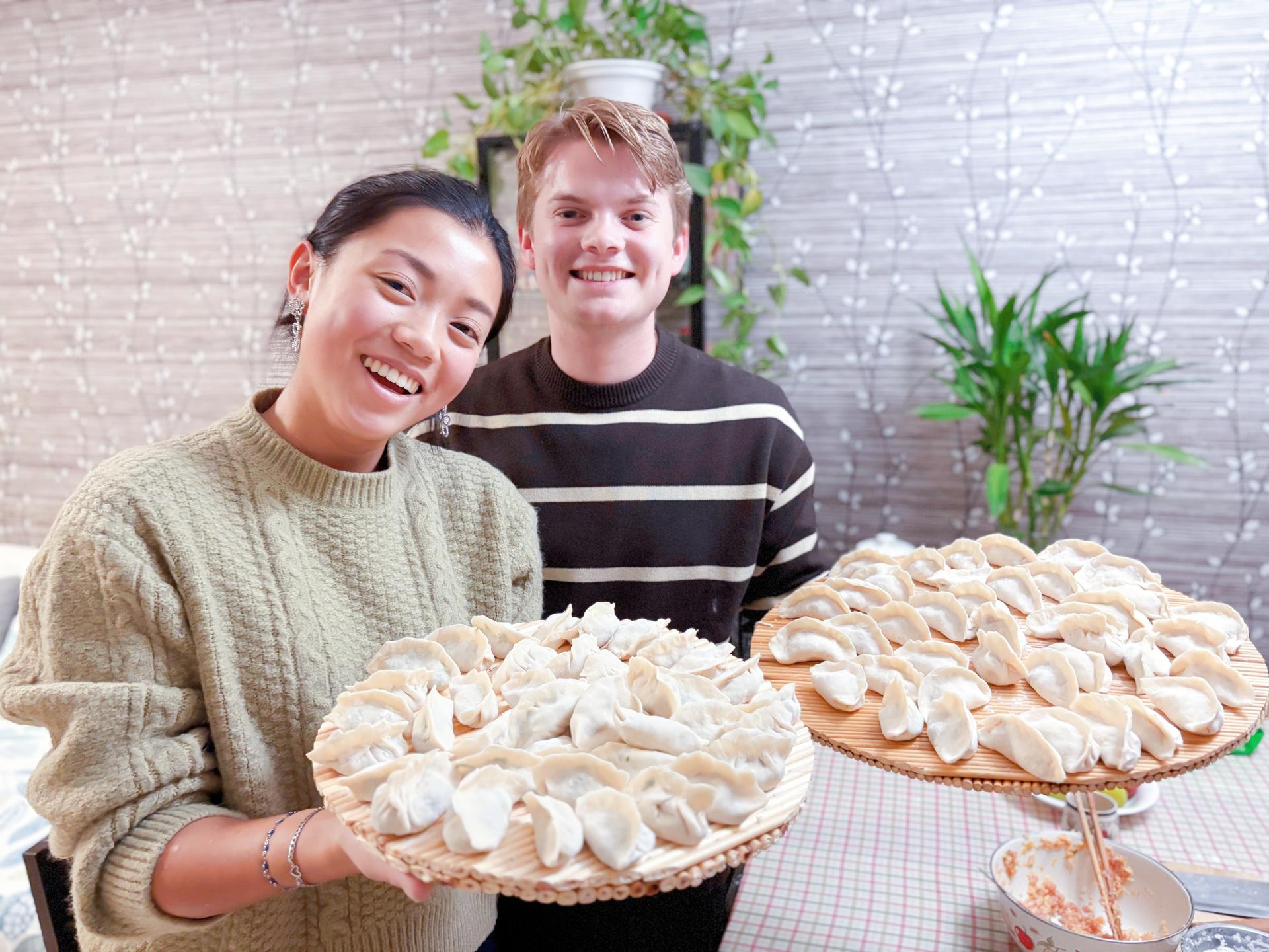 Visit a local farmers market, learn to make dumplings or wontons together at home (vegetarian options available) - Image 1