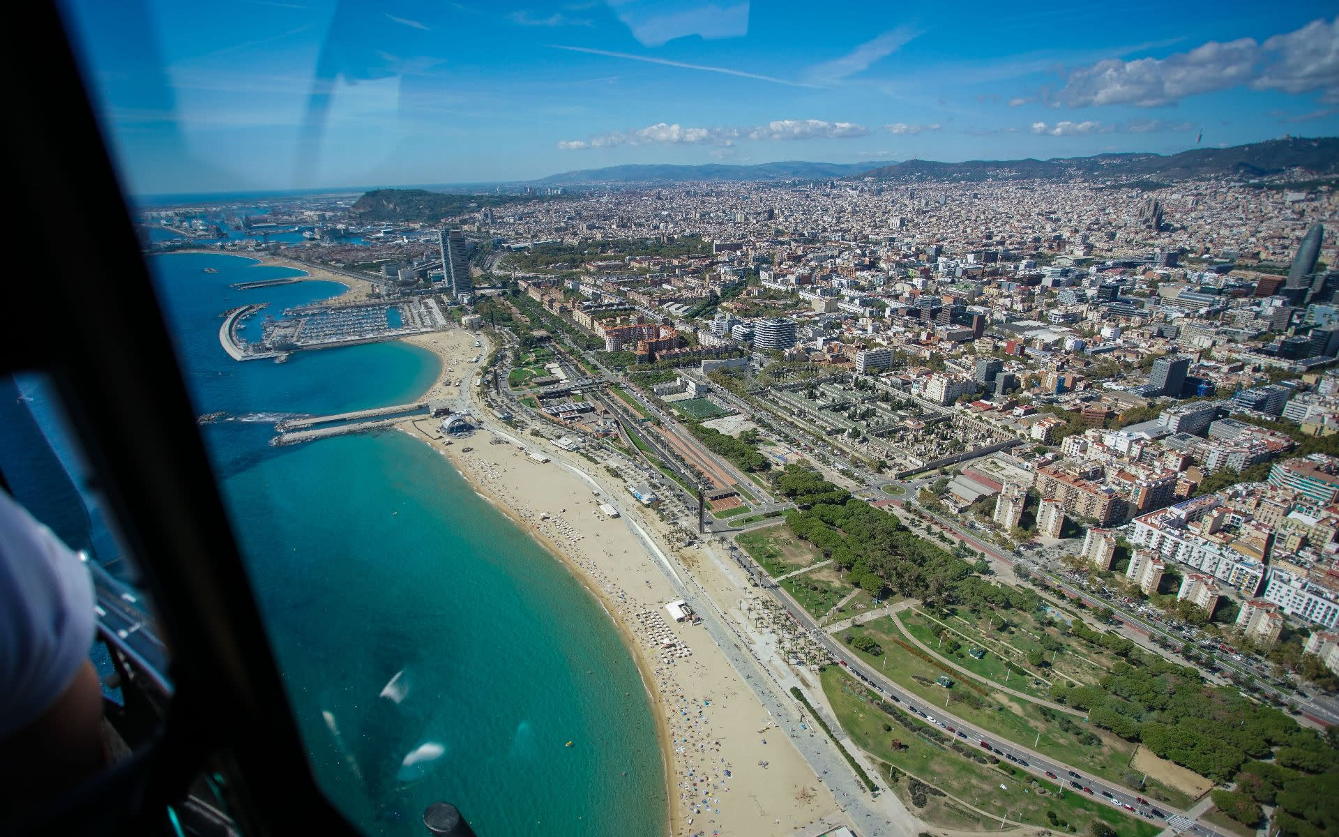 Panoramic helicopter & yacht sailing experience in Barcelona - Thumbnail 5