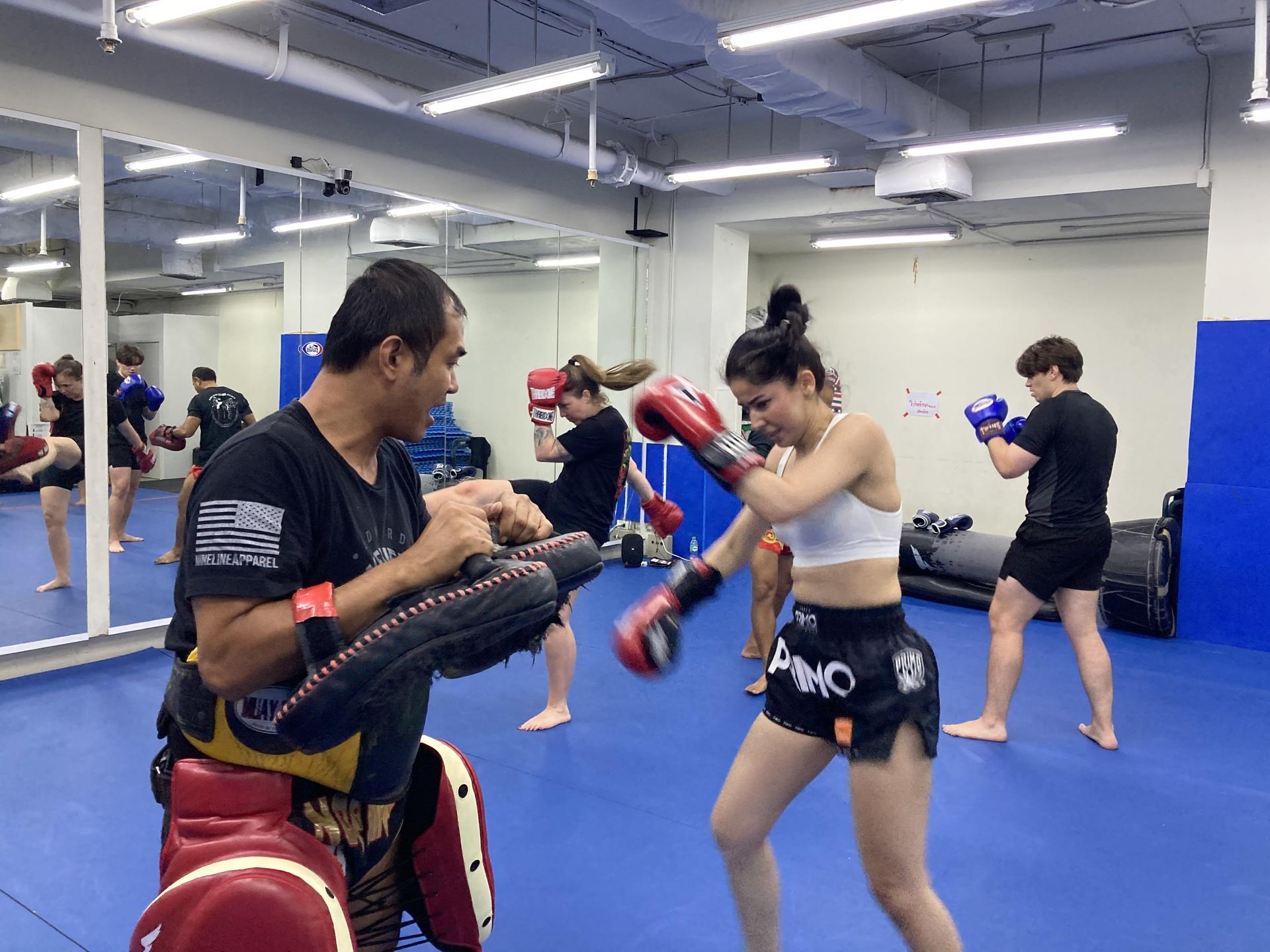 Bangkok Muay Thai Experience with Live Match at Rajadamnern Stadium - Image 1