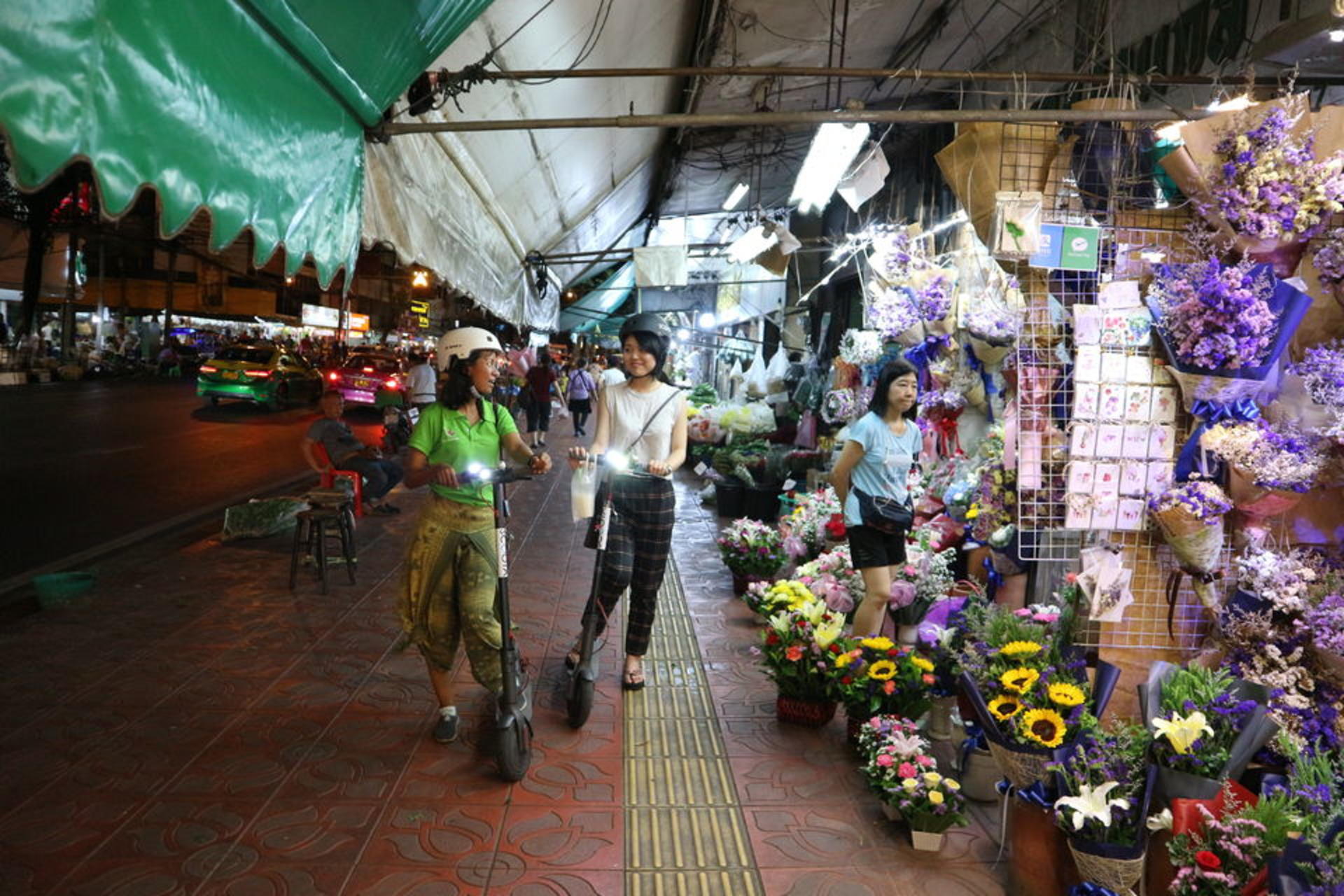 E-Scooter Night Tour with Local Street Food - Thumbnail 3