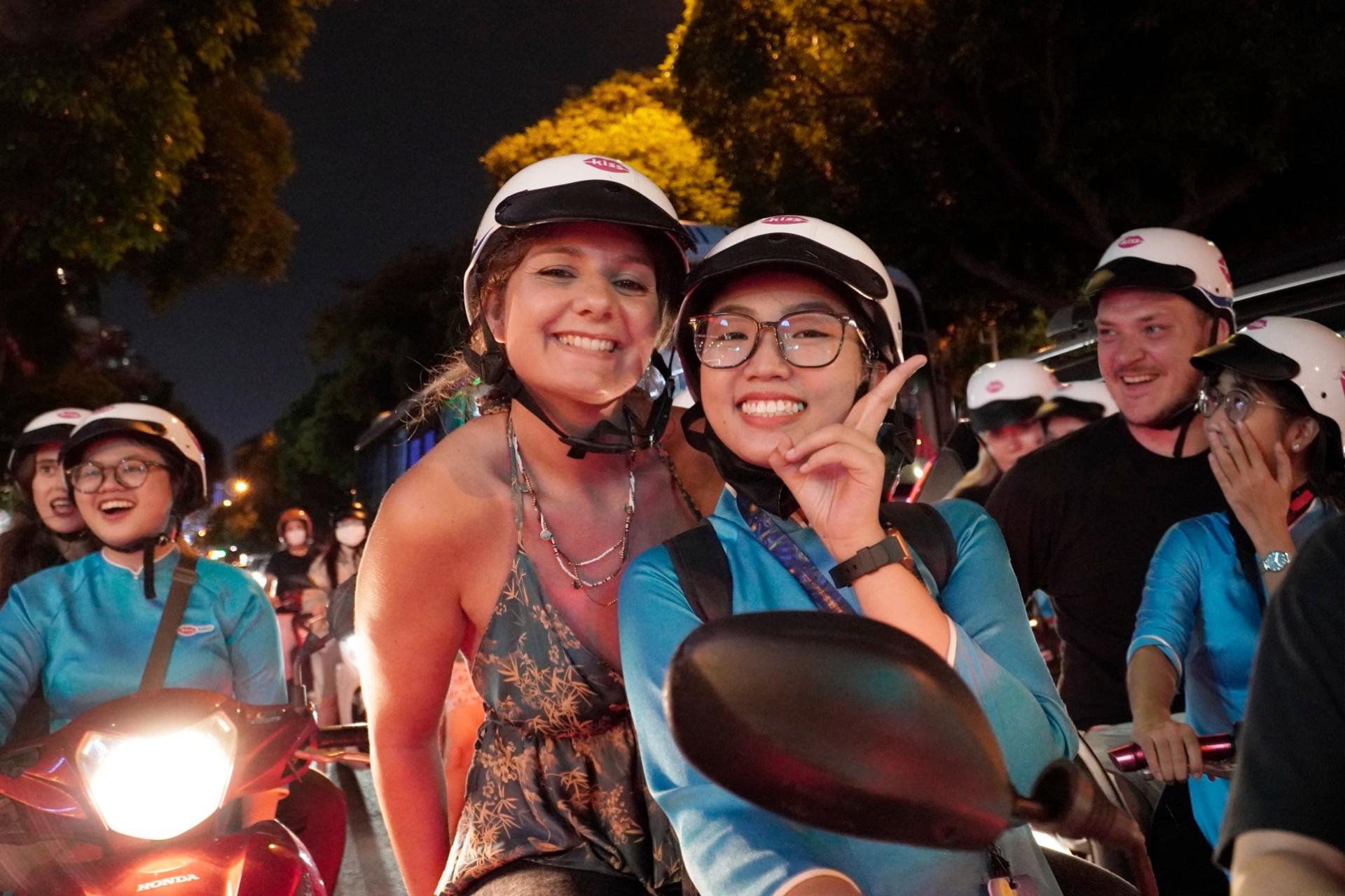 Street Food & Sightseeing Tour with Aodai Rider in Ho Chi Minh City - Image 1
