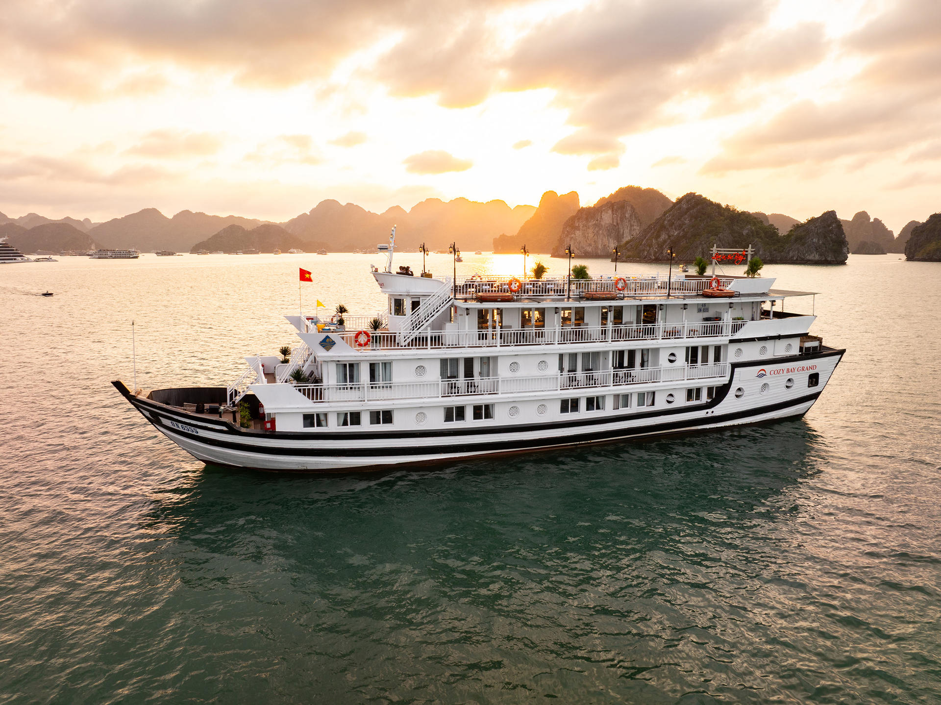 Cozy Bay Grand 2D1N Cruise: Ha Long Bay, Sung Sot, Ti Top - Image 1
