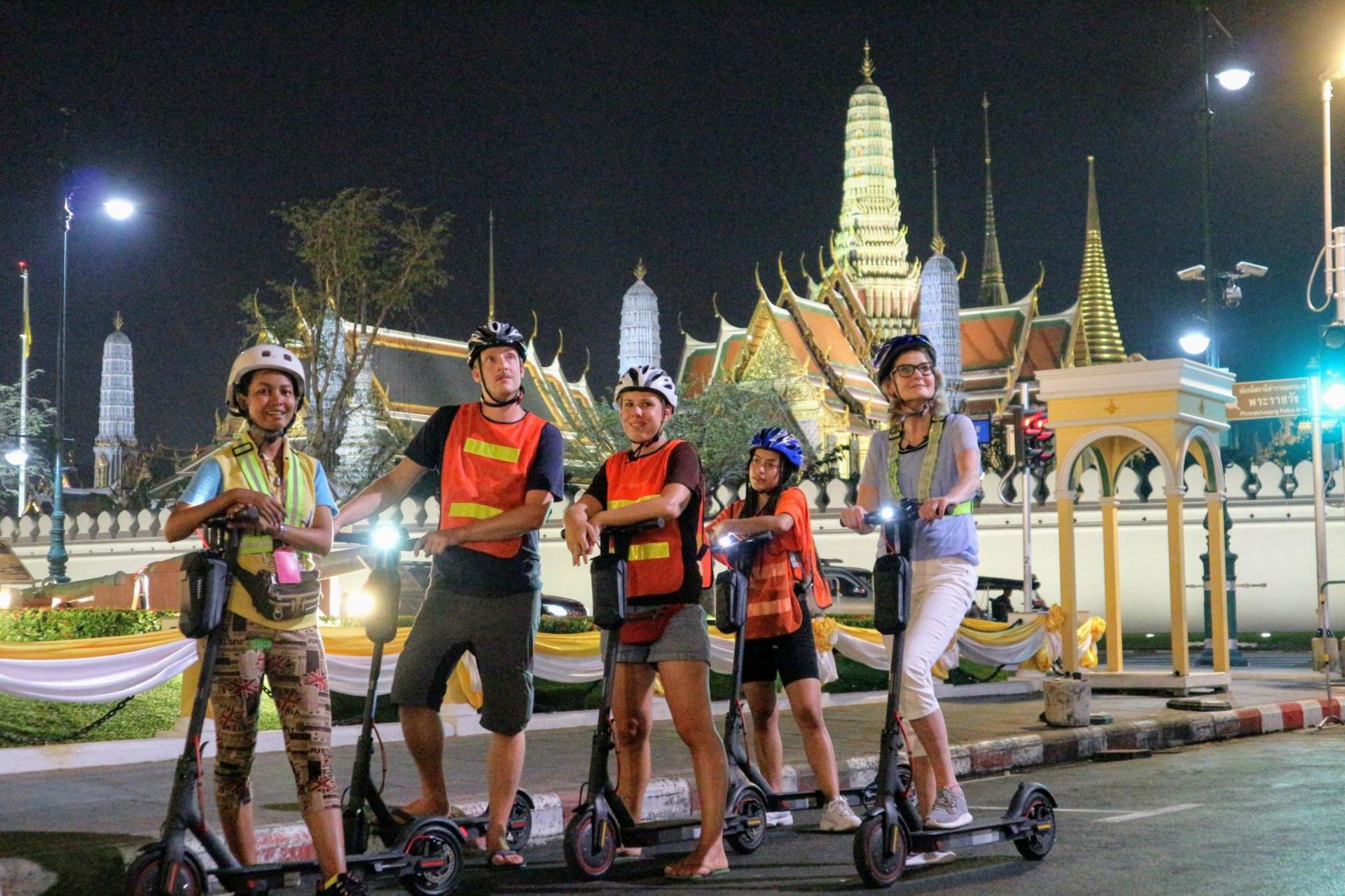 E-Scooter Night Tour with Local Street Food - Thumbnail 2
