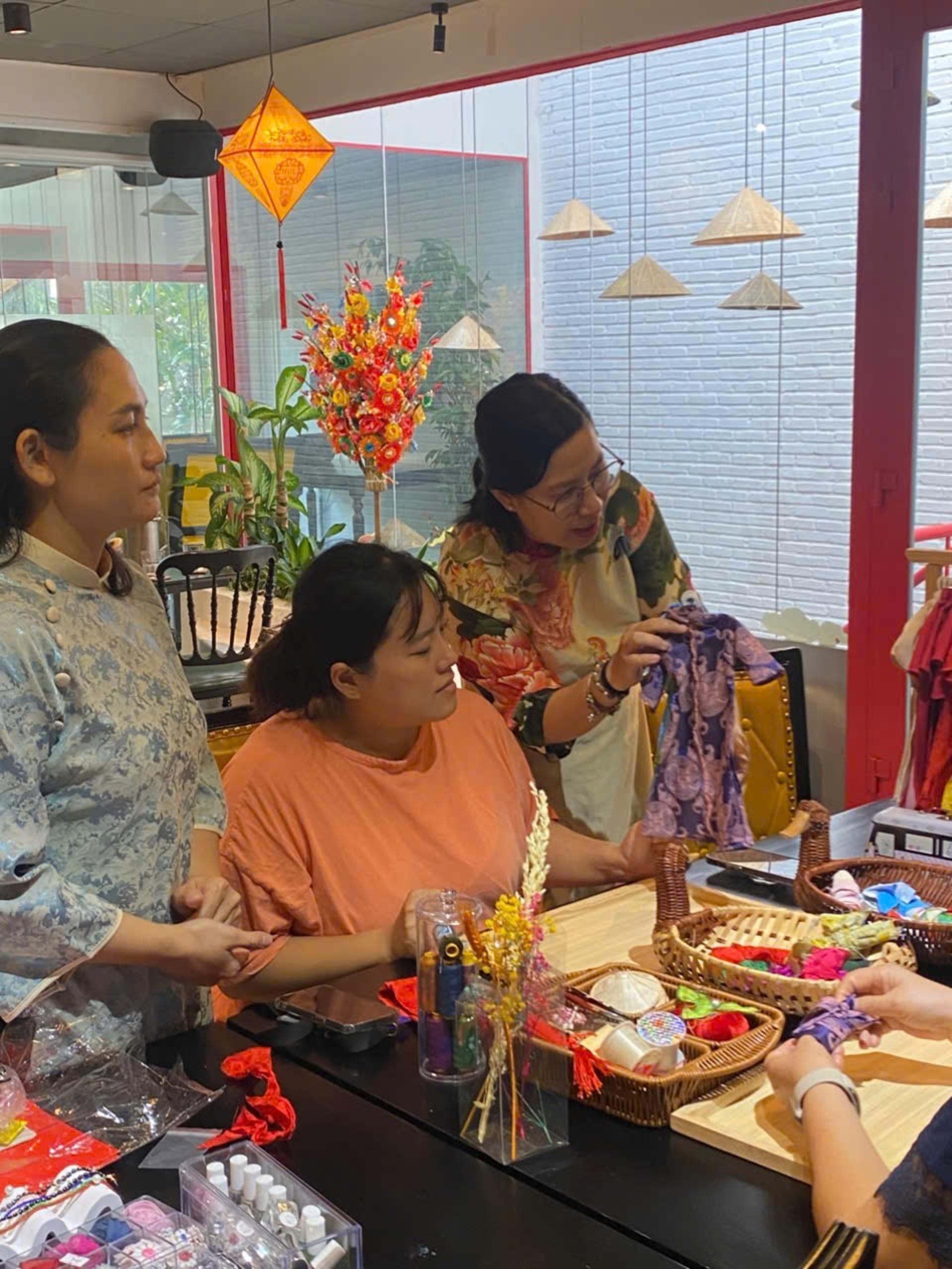 Mini Ao Dai Handcrafting Experience in Ho Chi Minh City - Thumbnail 14