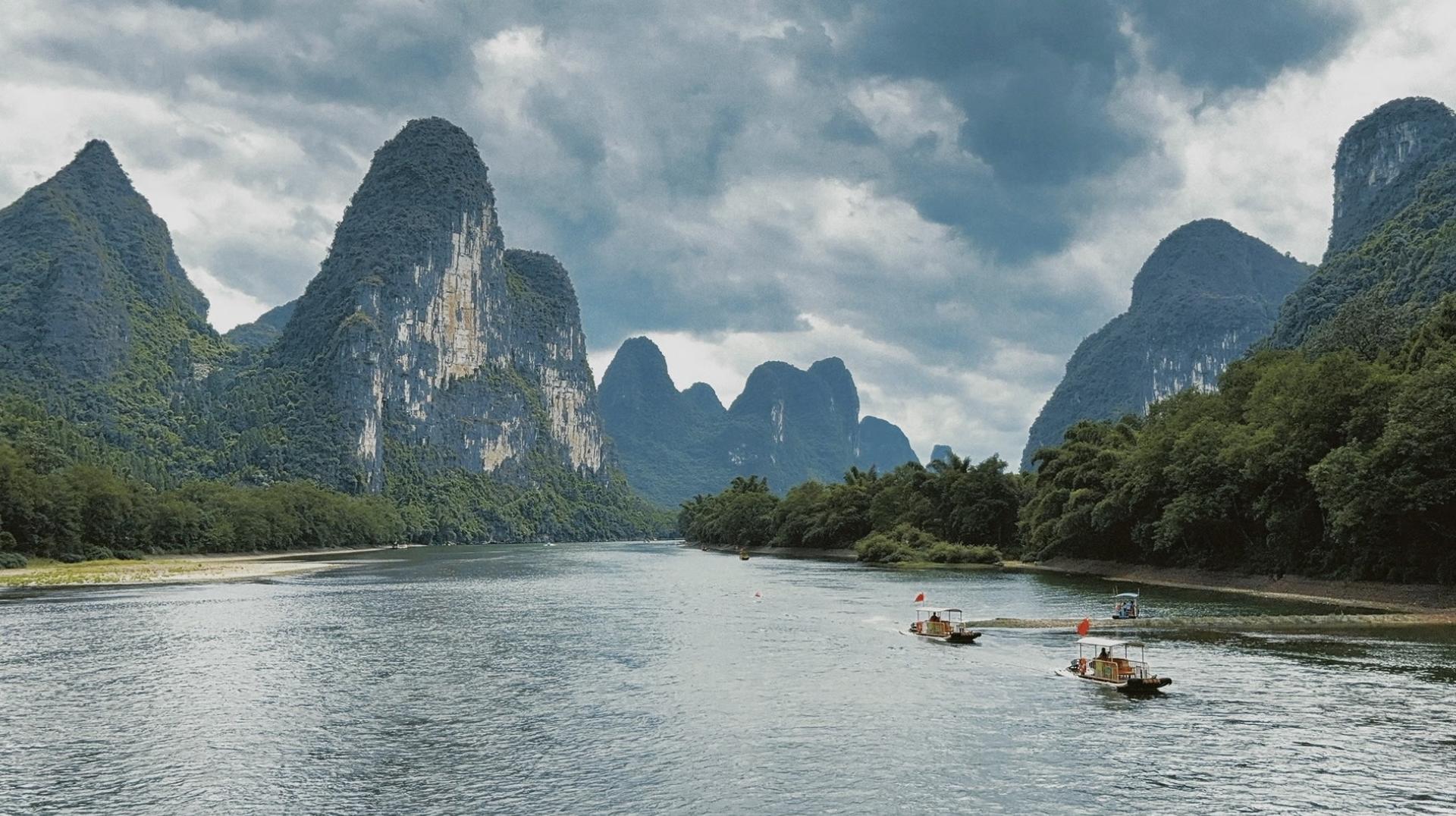 Yulong River Bamboo Rafting & Xianggong Mountain Full-Day Experience - Image 1
