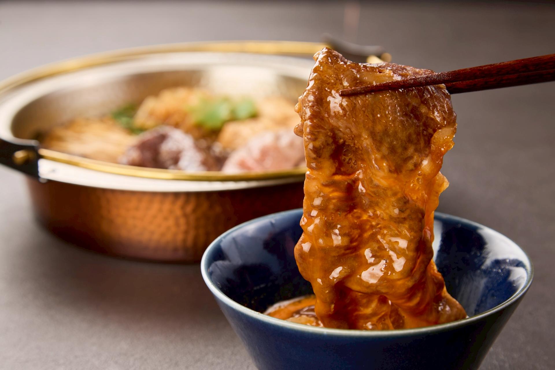 Experience Authentic Japanese Sukiyaki in Vibrant Dotonbori, Osaka - Thumbnail 4