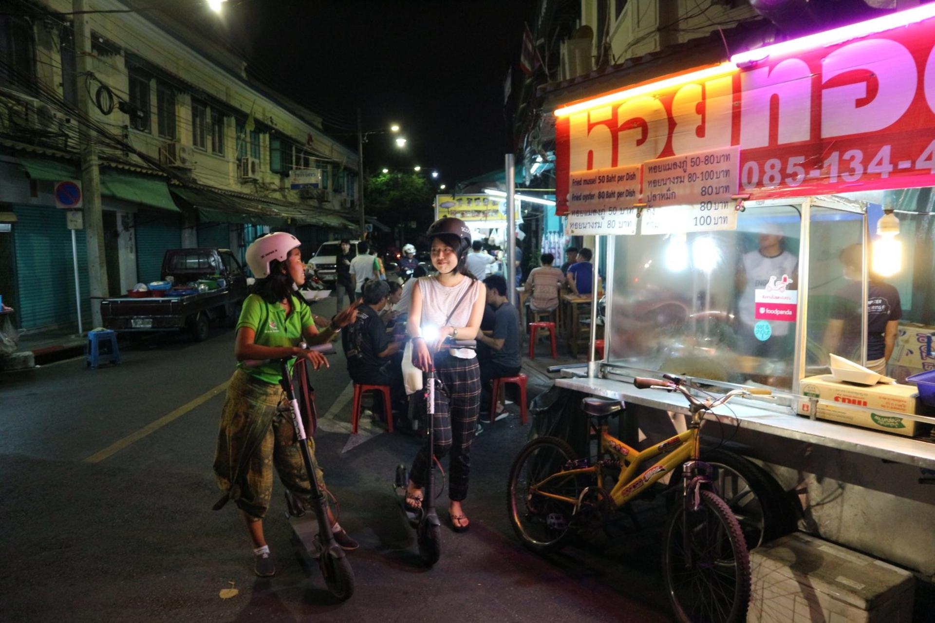 E-Scooter Night Tour with Local Street Food - Thumbnail 4
