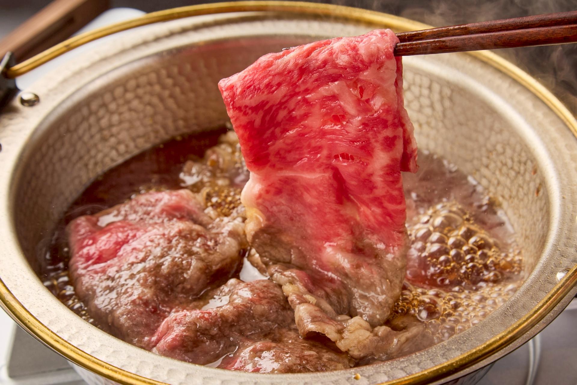 Experience Authentic Japanese Sukiyaki in Vibrant Dotonbori, Osaka - Thumbnail 5