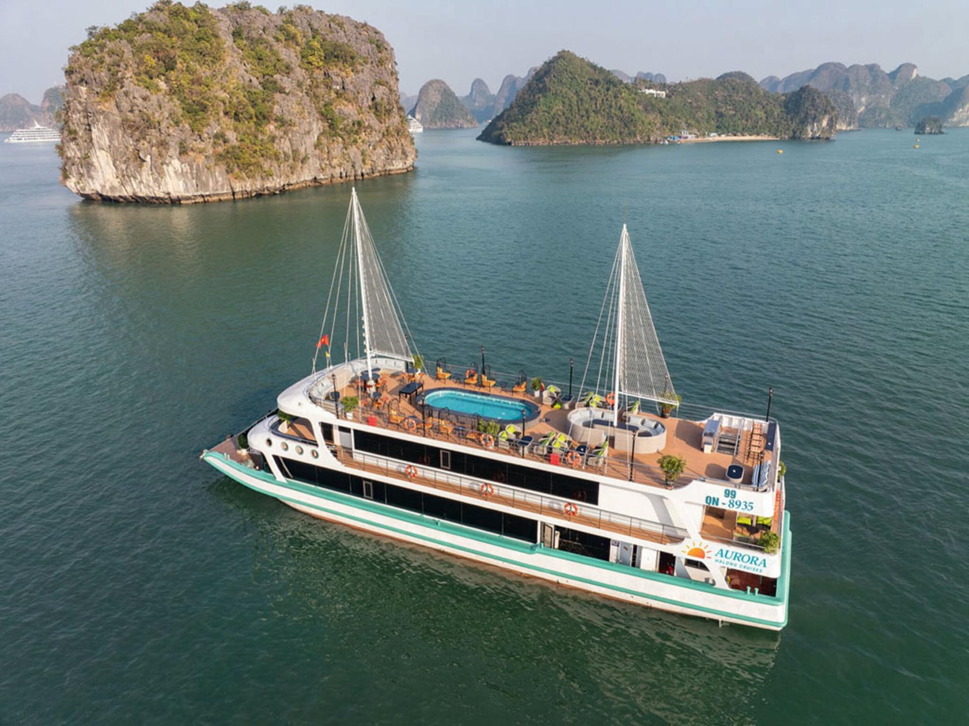 Aurora Day Cruise: Ha Long Bay with Sung Sot & Ti Top - Image 1