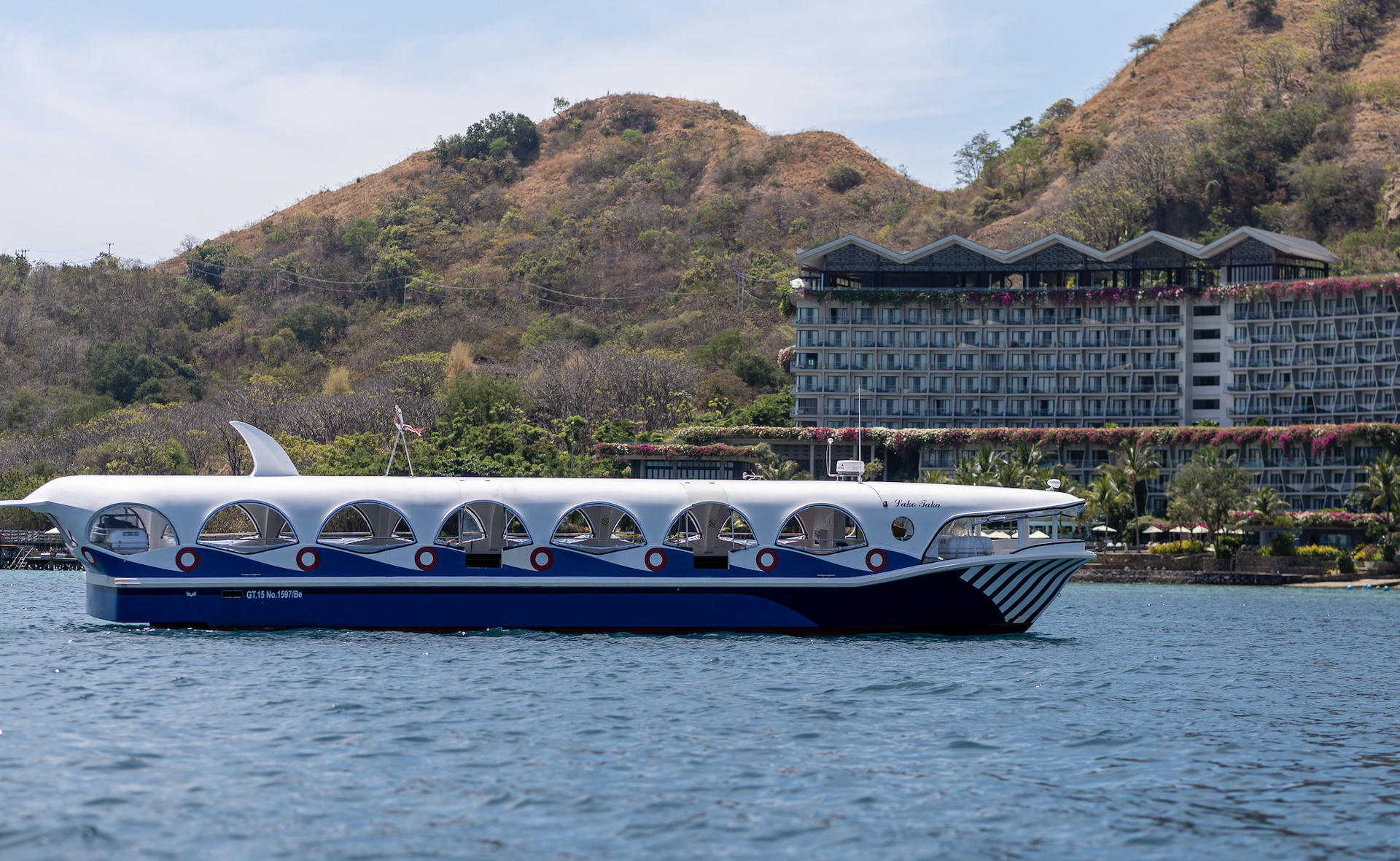 Glass Bottom Boat Trip in Labuan Bajo by AYANA Komodo Waecicu Beach - Image 1