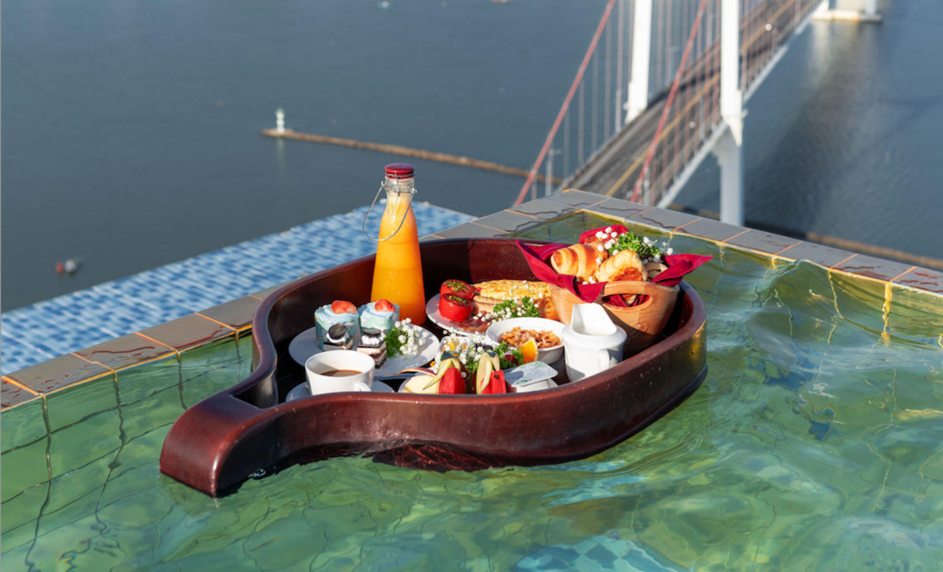 Floating Breakfast On Infinity Pool At Wyndham Danang Golden Bay - Image 1