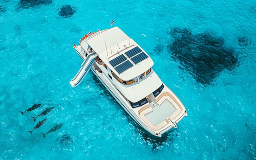 Esperienza di un'intera giornata in yacht alle isole Phi Phi e Maiton con fotografo