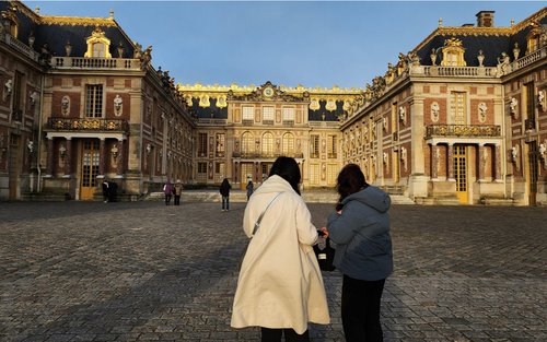 Tour guidato di un'intera giornata per piccoli gruppi a Parigi e Versailles