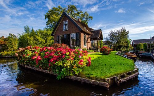 阿姆斯特丹包车：羊角村／赞斯堡 (风车村)／艾丹 - 沃伦丹，可选中文／广东话或英语司机