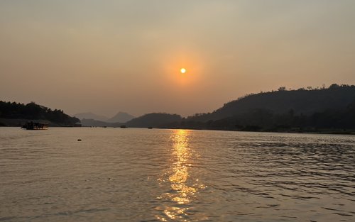 Sunset cruise on Luang Prabang river 