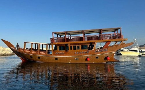 Dolphin Watching & Snorkeling on a Luxury Dhow Cruise