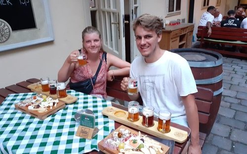 A couple enjoying beer