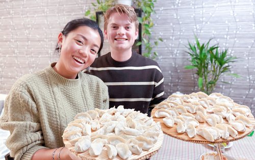Visit a local farmers market, learn to make dumplings or wontons together at home (vegetarian options available) 