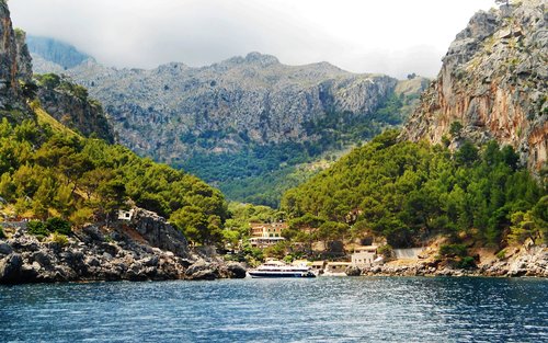 Mallorca day tour in Balearic Islands with train, tramway and boat
