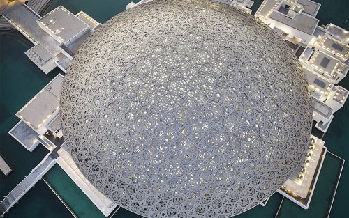 Stunning aerial view of Louvre Abu Dhabi: Where art meets breathtaking architecture!