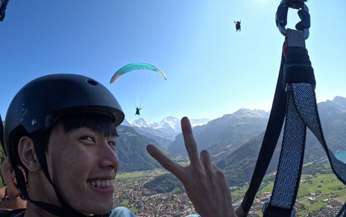 Tandem Paragliding Flight with Pilot over Bernese Oberland