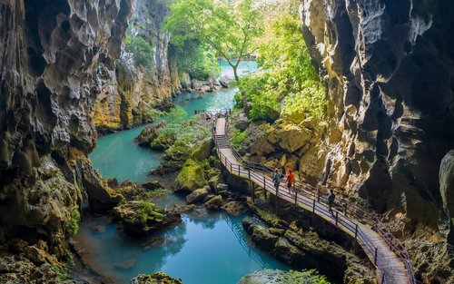Tagestour zur Paradise Cave und Dark Cave