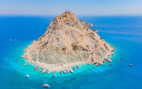Suluada Island and Adrasan Bay Boat Trip with Lunch and Transfers