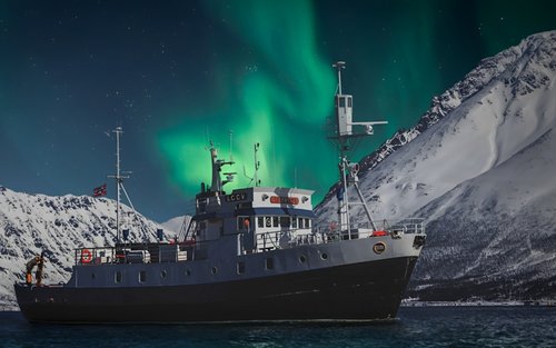 Crociera serale nel fiordo per ammirare l'aurora boreale a Tromsø