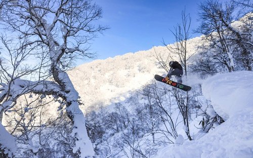Lección privada de esquí o snowboard para adultos y niños en RUSUTSU