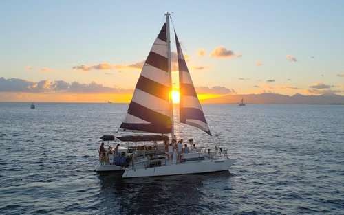 Sail into the Sunset with a Waikiki Swim in Oahu, Hawaii