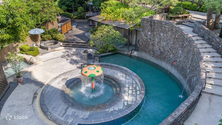 The terraced open-air pools at Spring City Resort seen from above