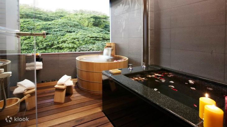 Twin cypress barrel tubs in a private room at Golden Hot Spring Hotel, Beitou