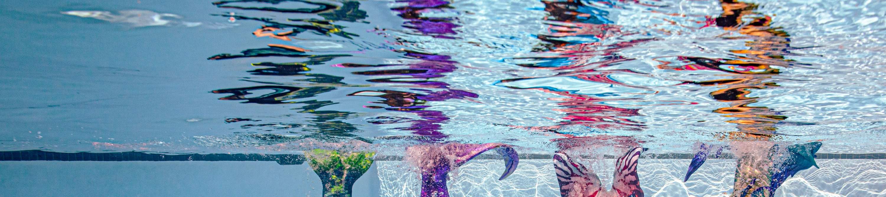 4 mermaid swimming