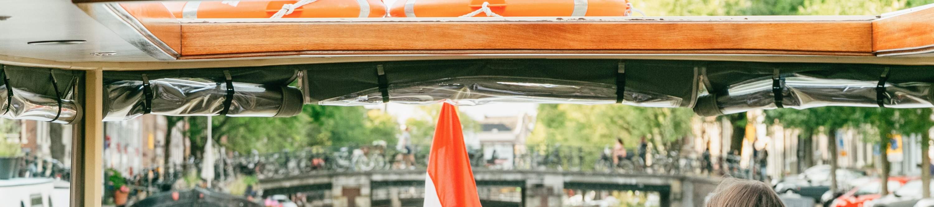 Amsterdam Luxury Saloon Boat Canal Cruise Tour with Wine and Cheese Klook