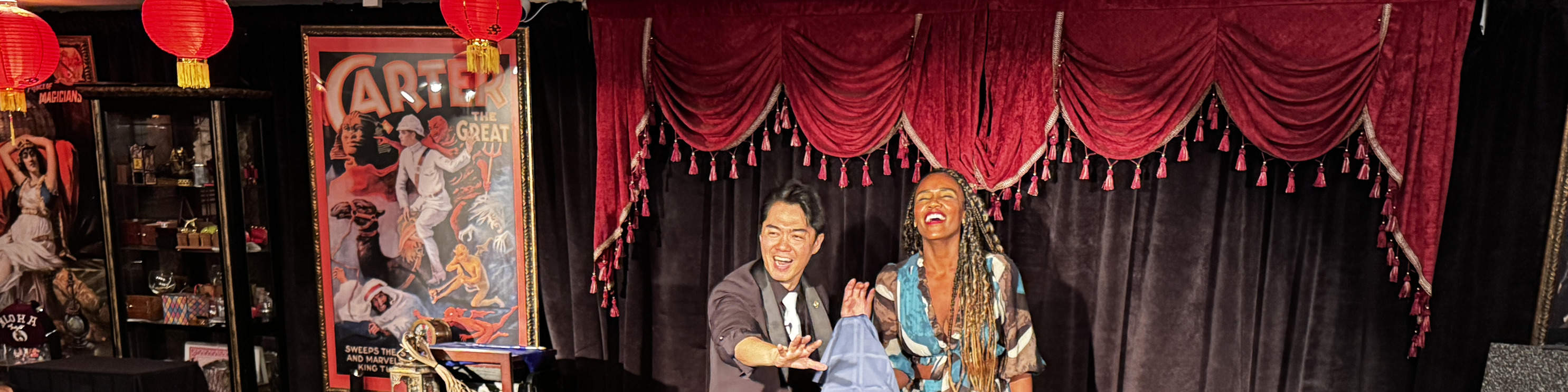 Watch guests captivated by the mesmerizing show, completely immersed in a night of magic