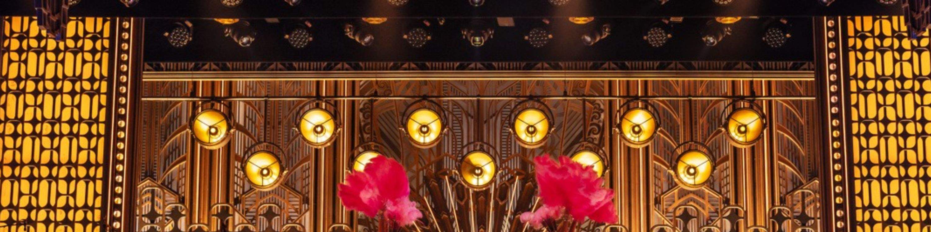 Jonathan Groff dances as Bobby Darin, leading a high-energy number that brings the house down