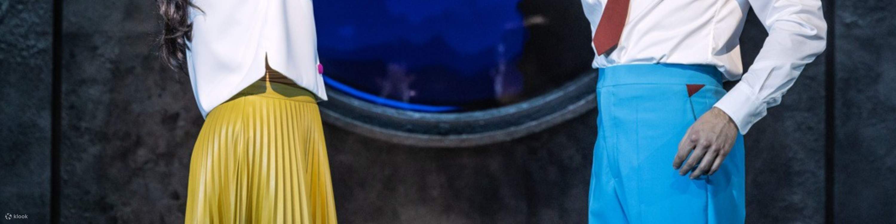 Oliver and Claire dance under soft lights in a moment of hopeful joy